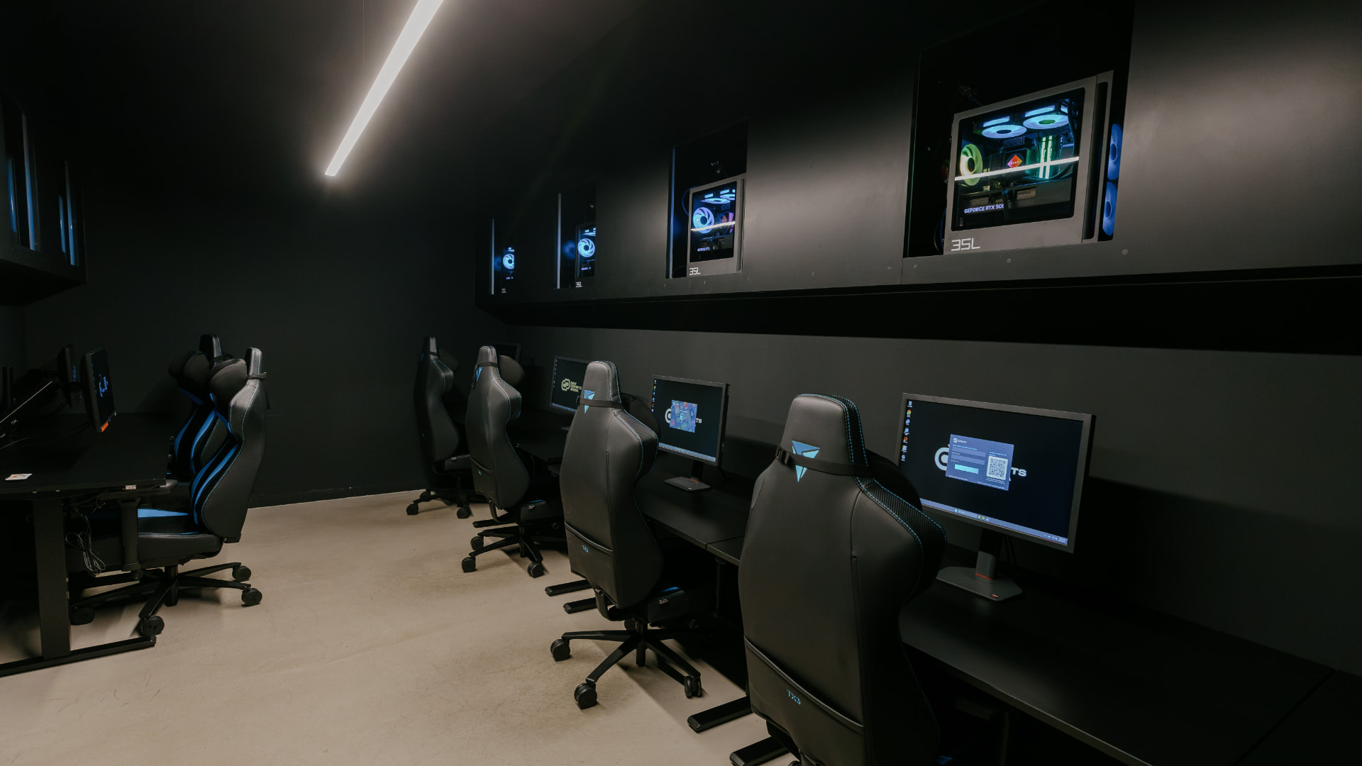 Gaming stations in the practice area at SAW Esports Arena