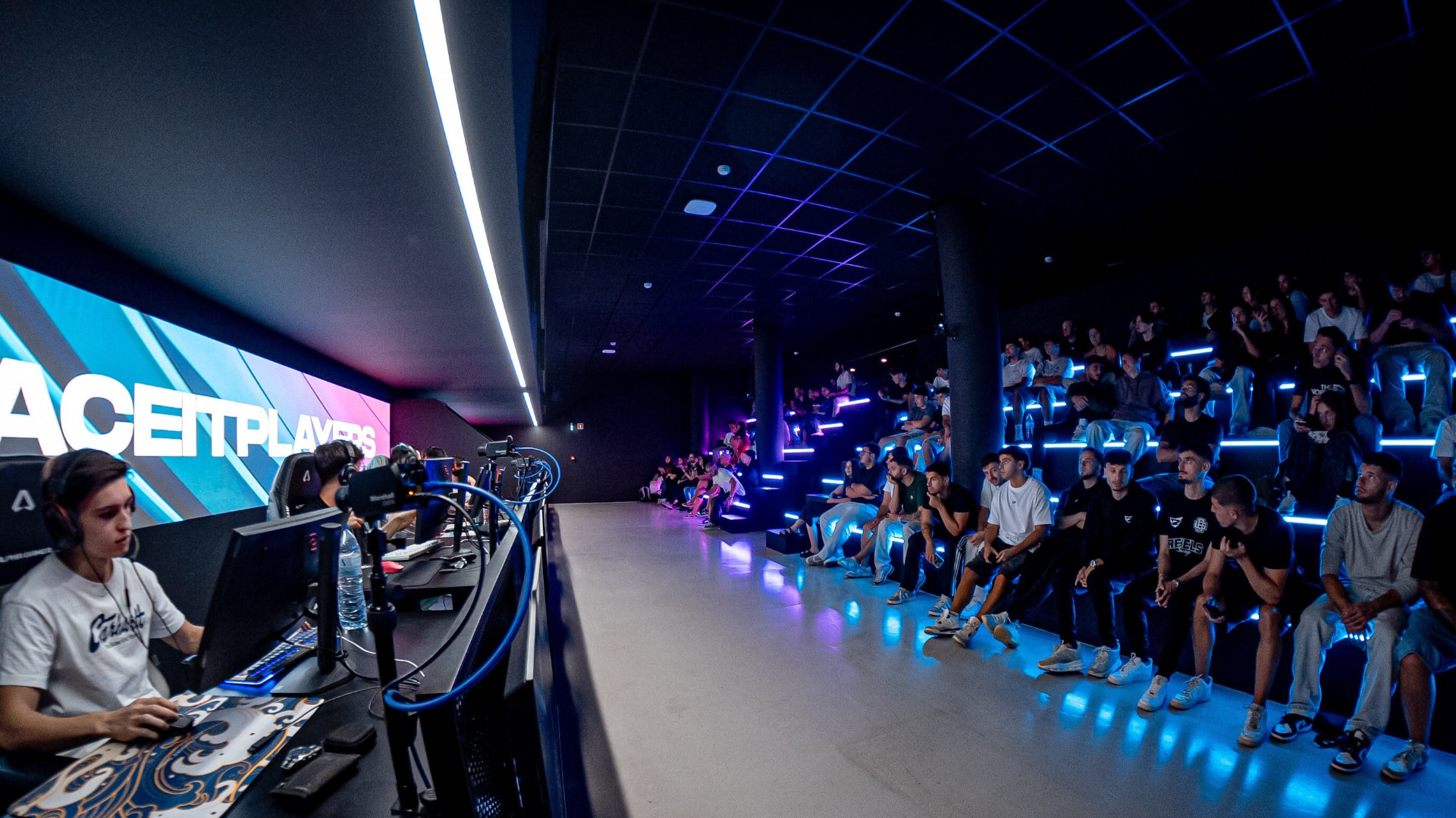 Spectators watching a live match at SAW Esports Arena
